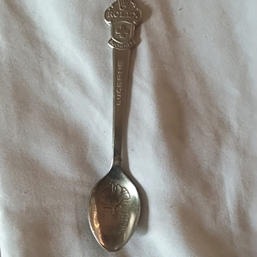 Silver Rolex demitasse spoon